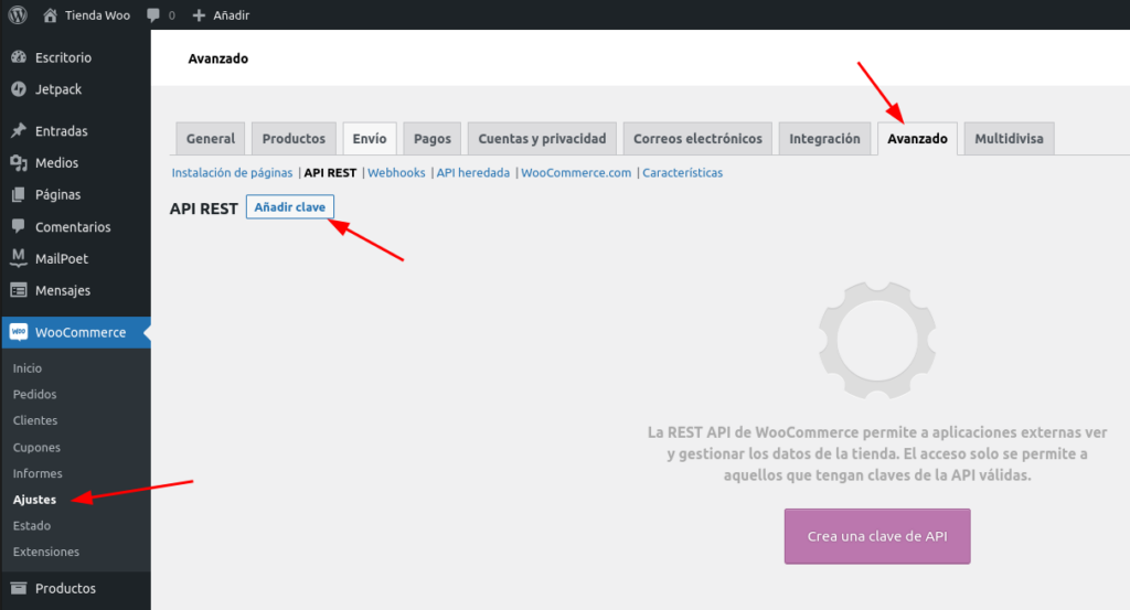 Interfaz de ajustes avanzados en WooCommerce dentro de WordPress, señalando los pasos para añadir una nueva clave de API REST.